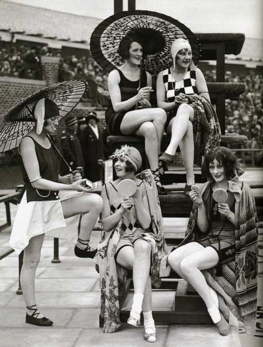 Wanton British harlots, unabashedly modeling 1928's latest swimsuits, powdering their noses, and smoking