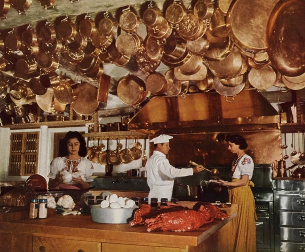 Swan Lake Ranch, Alcalde, New Mexico, 1949. Owner Mrs. Hamilton Garland collects copperware. 